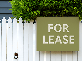 For Lease Sign on Fence